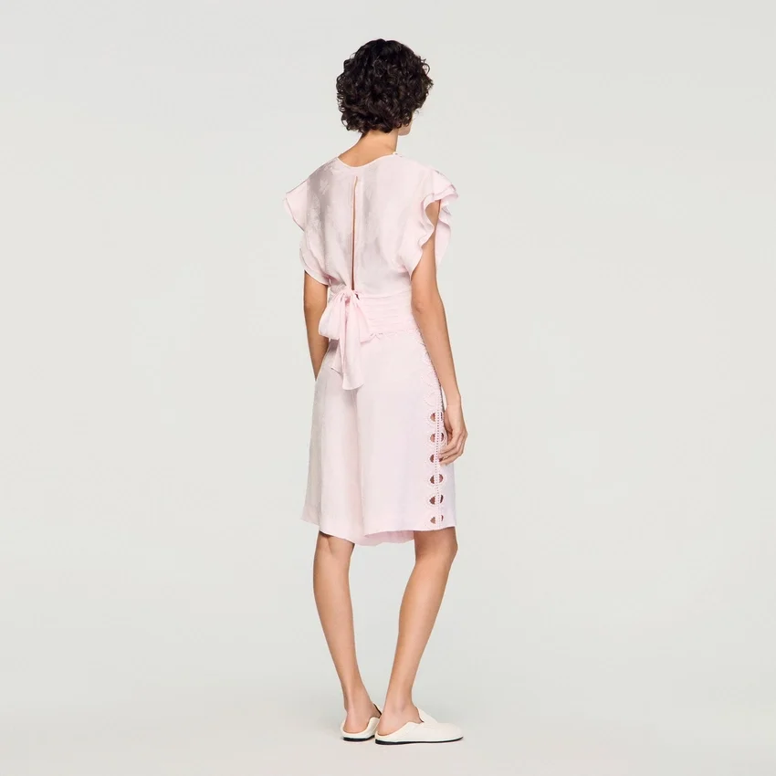 Kort topp i blommig jacquard - Bild 6